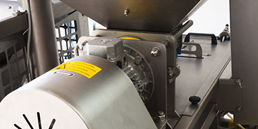 An image of Farquar Family Winery's Toscana Enologica Mori (TEM) olive mill and washing machine